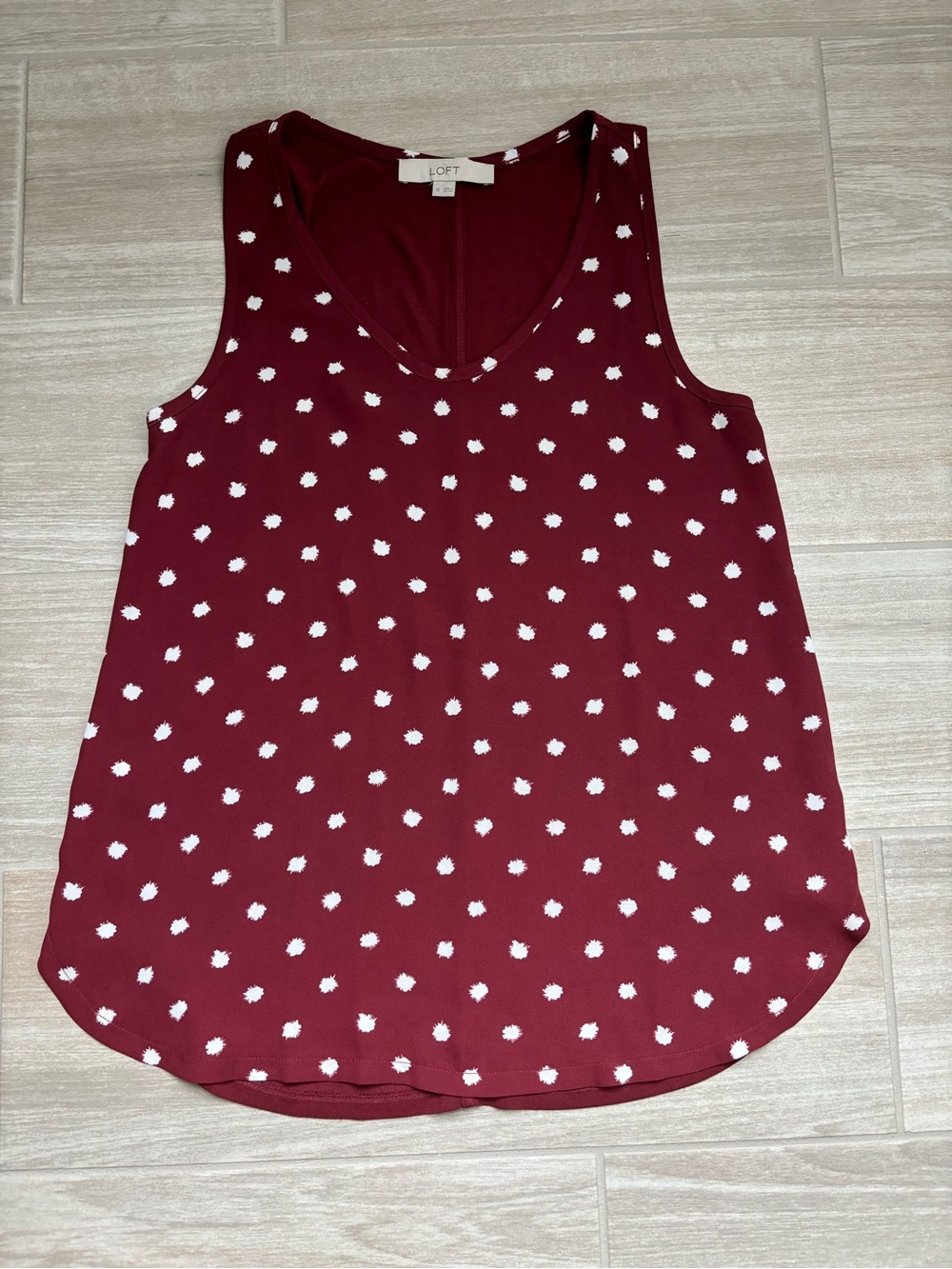 LOFT Maroon tank top with scattered white dot detailing.  Size XS